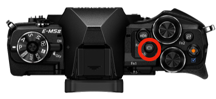 Top view of OM-D E-M5 Mark II and location to switch between viewfinder and LCD