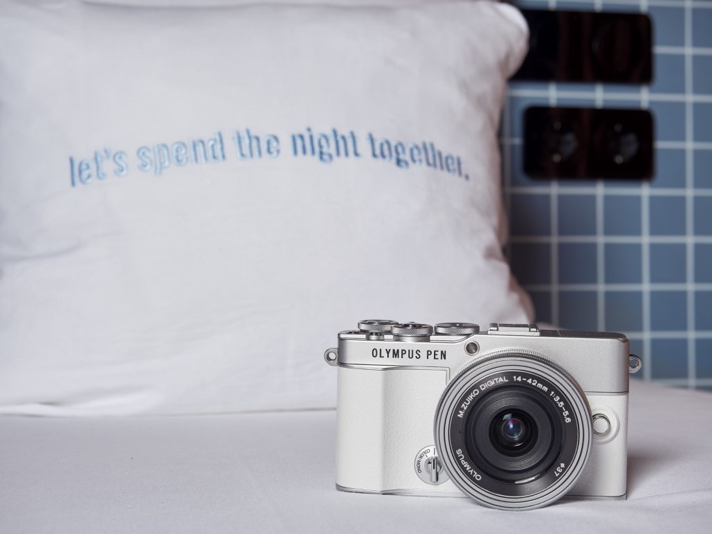 E-P7 infant of a pillow with the text "let's spend the night together"