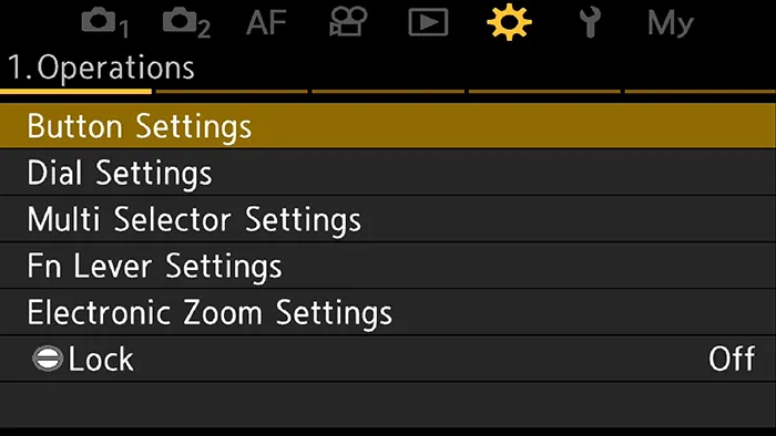 OM-1 gear menu with the camera button settings